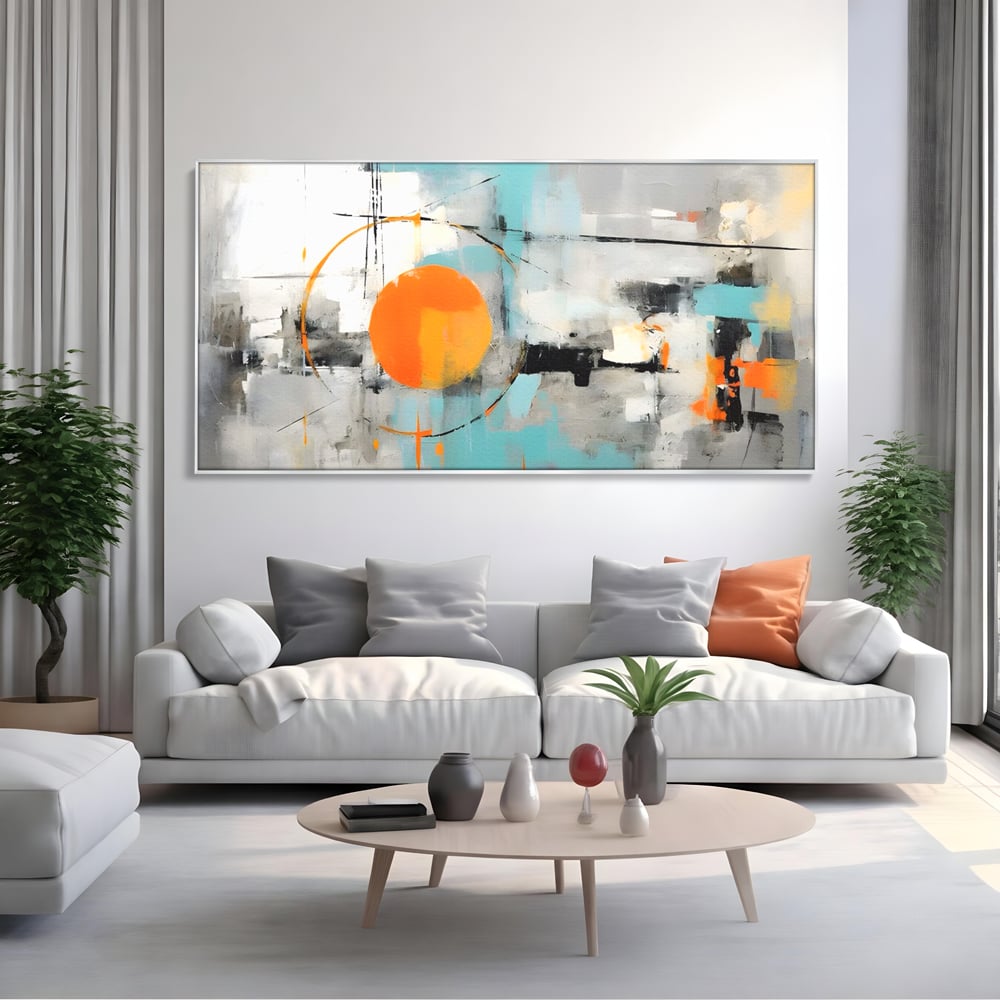 Tablou canvas cu pictura abstracta cu cerc portocaliu, in rama de aluminiu argintiu, pe perete intr-un living